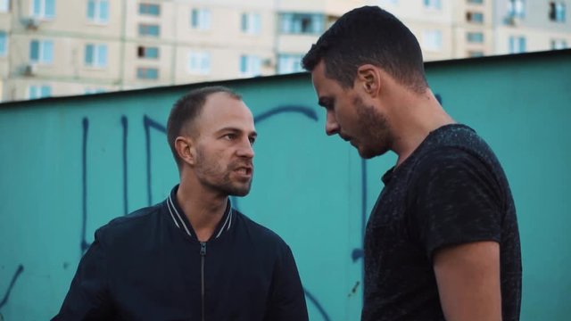 A gangster has attacked a young guy in the ghetto