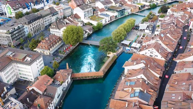 Aerial panoramic view of cityscape of Thun, picturesque town on river Aare - landscape panorama of canton of Bern from above, Switzerland, Europe