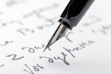 Fototapeta premium Fountain Pen on Written Page
