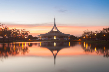 Fototapeta na wymiar Monument in public park of thailand. Twilight shooting reflection on water concept at the Suanluang Rama 9, Thailand