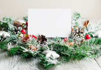 Christmas wreath, greeting card and Christmas background on a light background.