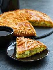 a piece of delicious fish cake, on a gray background.
