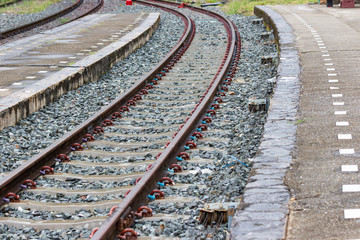 Fototapeta premium The railroad tracks curve along the way For train travel Bangkok Thailand.