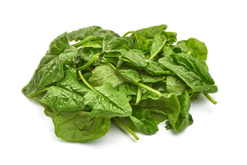 Green spinach leaves, isolated on a white background. Close-up