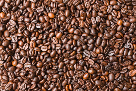Coffee beans background. © ketsiam