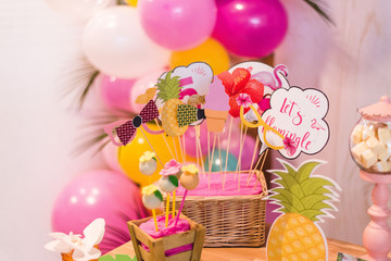 basket with photo props signs 