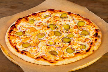 Pizza with pickled cucumbers