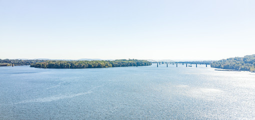 Patapsco river panorama with highway bridges during day in Baltimore, Maryland, USA, panoramic blue water