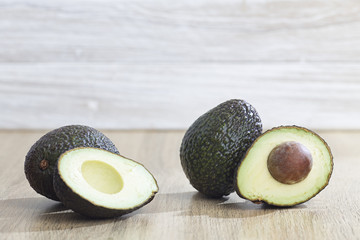 Fresh avocado on a wooden table