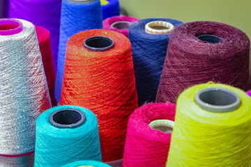 colored yarn on cones