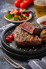 Tischdecke Steak beef. Beef steak medium with red pepper, aromatic herbs and fried onion © FoodAndPhoto