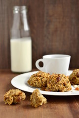 Oatmeal cookies with banana, raisins and coffee, vertical 
