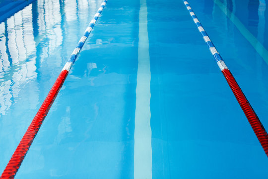 Image from top of swimming pool with red dividers