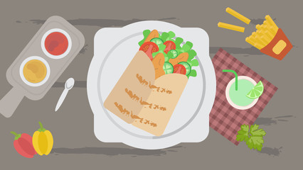 Shawarma with French fries, sauces and cocktail on a checkered tablecloth