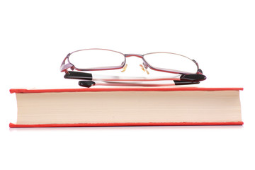 Books and glasses for vision on a white background. Isolation.