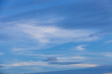 sky background with nice clouds on bright blue sky