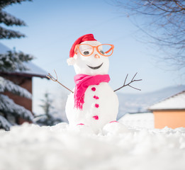 Snowman on snow background