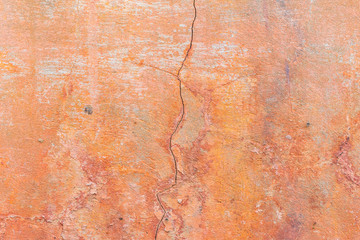 Wall fragment with scratches and cracks. It can be used as a background