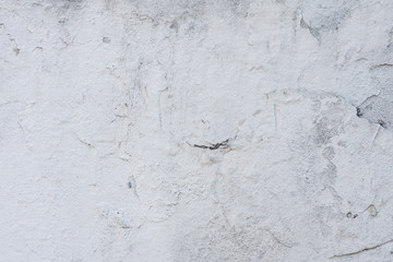 Obraz premium Wall fragment with scratches and cracks. It can be used as a background