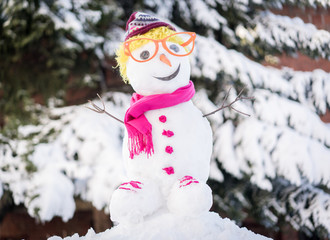 Snowman on snow background