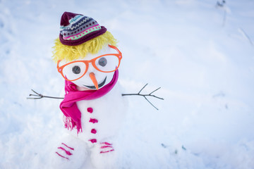 Snowman on snow background