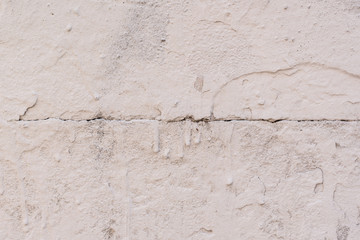 Wall fragment with scratches and cracks. It can be used as a background