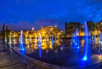 Romantic scene of the famous fountain on Place Massena in Nice, France