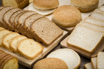 Overhead view of a still life of different types of bread for sandwich