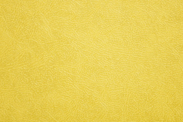 Golden textured leather or foil texture background. Abstract foil texture for artwork