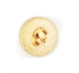 champignon soup with croutons on white background