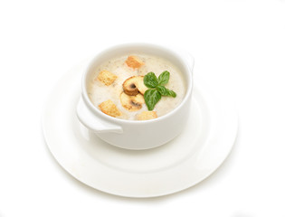 champignon soup with croutons on white background