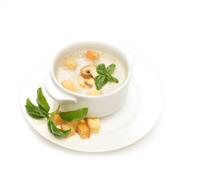 champignon soup with croutons on white background