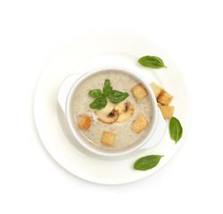 champignon soup with croutons on white background