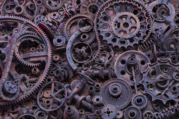 Steampunk background, machine parts, large gears and chains from machines and tractors.