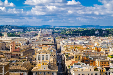 Obraz premium Beautiful panoramic view of the Rome houses roofs and green hills.