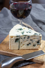 Roquefort soft French cheese made from sheep milk on  south of France, one of the world's best known blue cheeses with blue mold