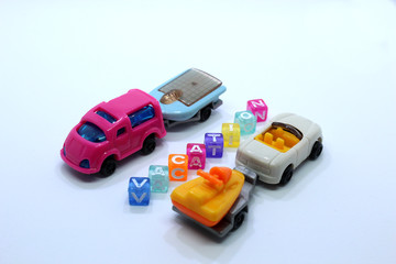 toy cars with vacation  word