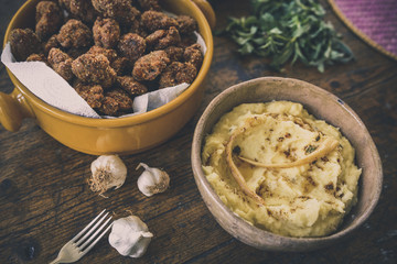 Homemade meatballs and mash potatoes with garlic burnt butter.