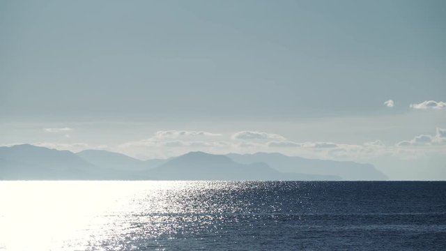 Greek sea coastline with mountains, Greece Peloponnese. Time lapse
