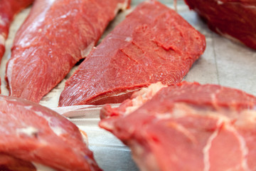 Raw beef meat on a cutting board