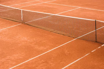Fotobehang empty clay tennis court © Bonsales