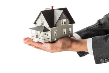 Men's Cupped Hands Holding a Model of a House