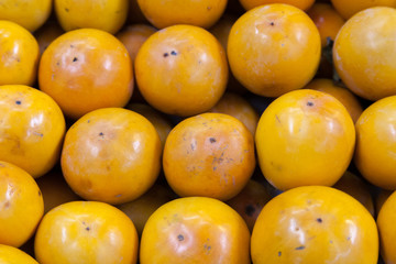 fresh ripe persimmons isolated on white background