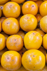 fresh ripe persimmons isolated on white background