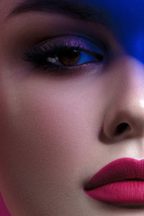 Fototapeta premium Young beautiful woman with clean perfect skin with blue filters