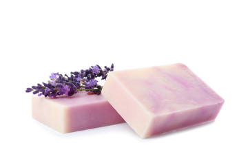 Handmade soap bars and lavender on white background