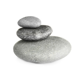 Obraz na płótnie Canvas Stack of zen spa stones on white background