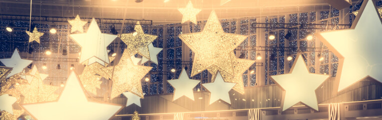 Stars shape show celebrity background  with spotlights soffits   vintage yellow golden colors as stage performance background  - obrazy, fototapety, plakaty