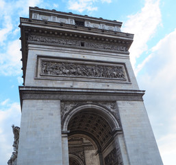 Fototapeta na wymiar Details on the Arc de Triomphe (Triumphal Arch) in Paris. Side view