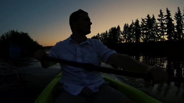 Peaceful Evening Kayak Escape Paddling at Sunset